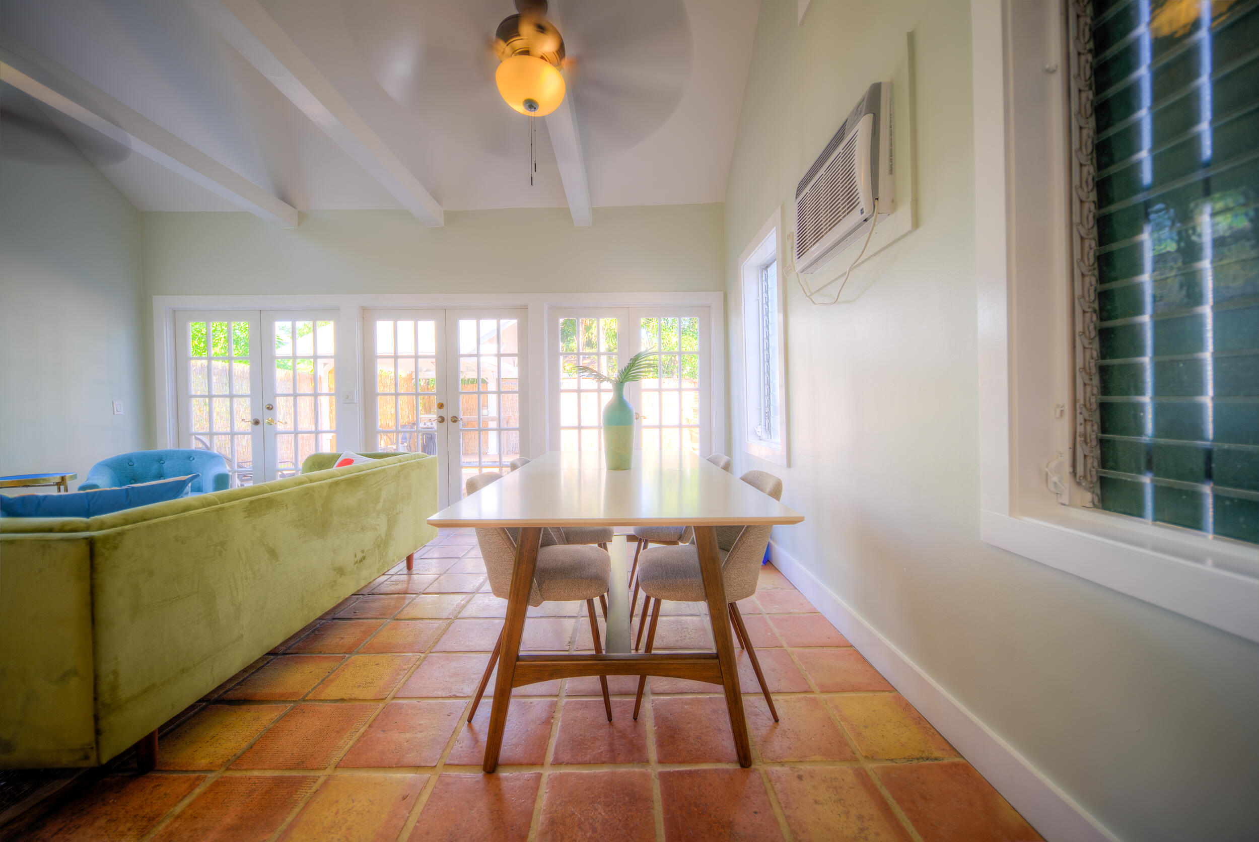 1317 Newton Street Key West, FL 33040 - Photo 8 of 19 a dining room with furniture and a large window