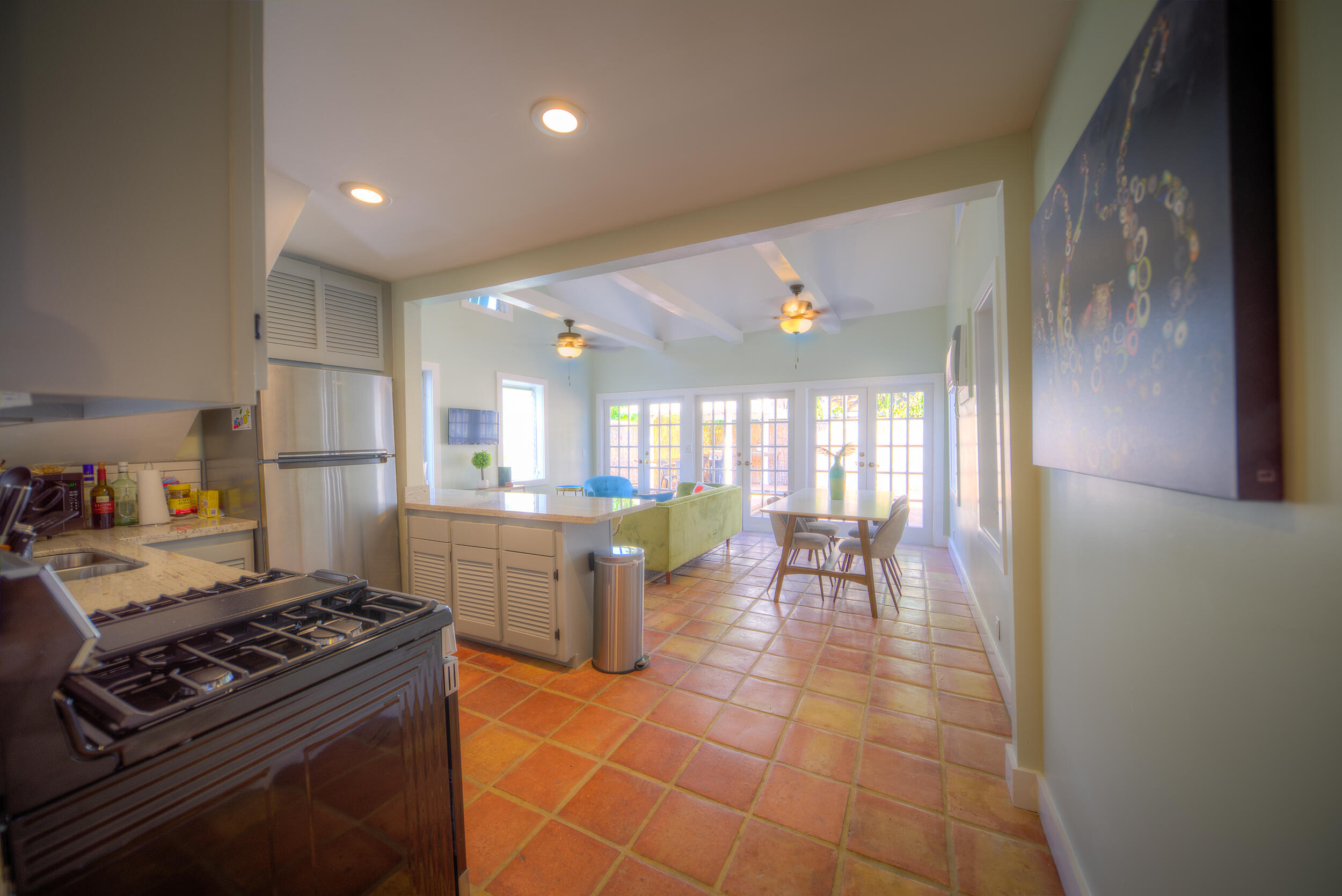 1317 Newton Street Key West, FL 33040 - Photo 9 of 19 a kitchen with a table and chairs