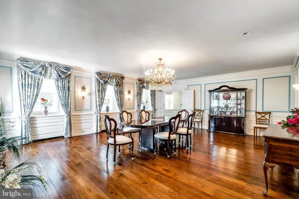 a view of a room with workspace and windows