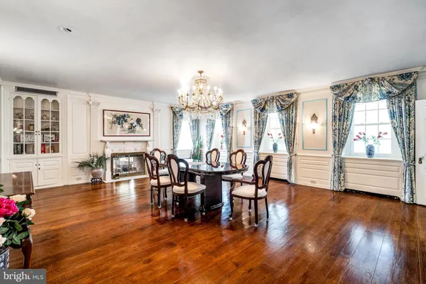 a view of wooden floor and a window