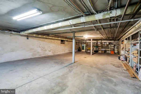 a view of a big yard with a house in the background