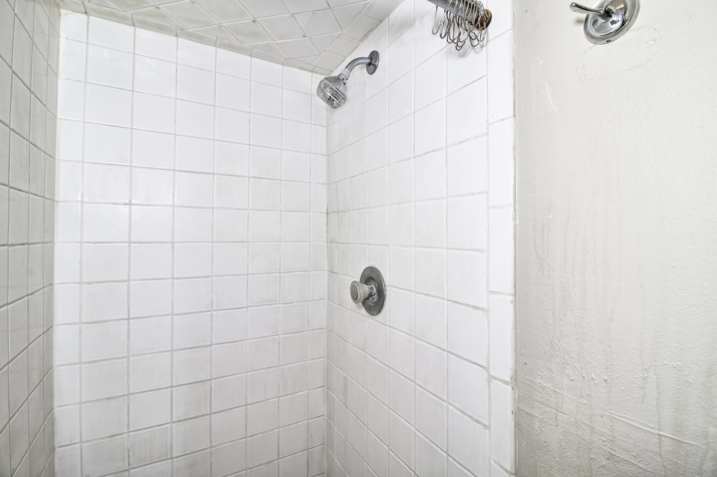 1002 Elm Avenue, Unit B Collbran, CO 81624 - Photo 17 of 17 a bathroom with a shower