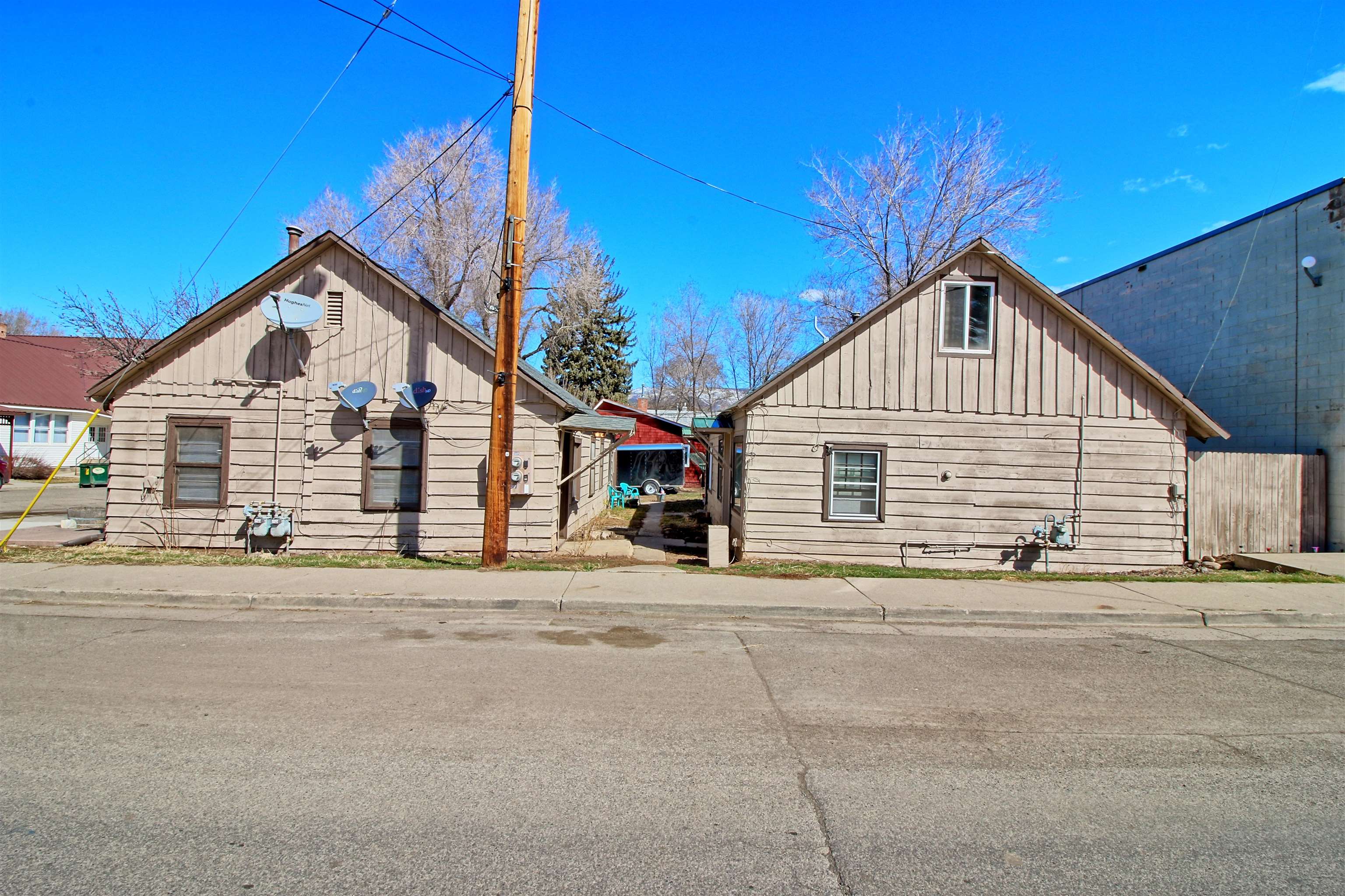 1002 Elm Avenue, Unit B Collbran, CO 81624 - Photo 5 of 17 a view of a house with a street