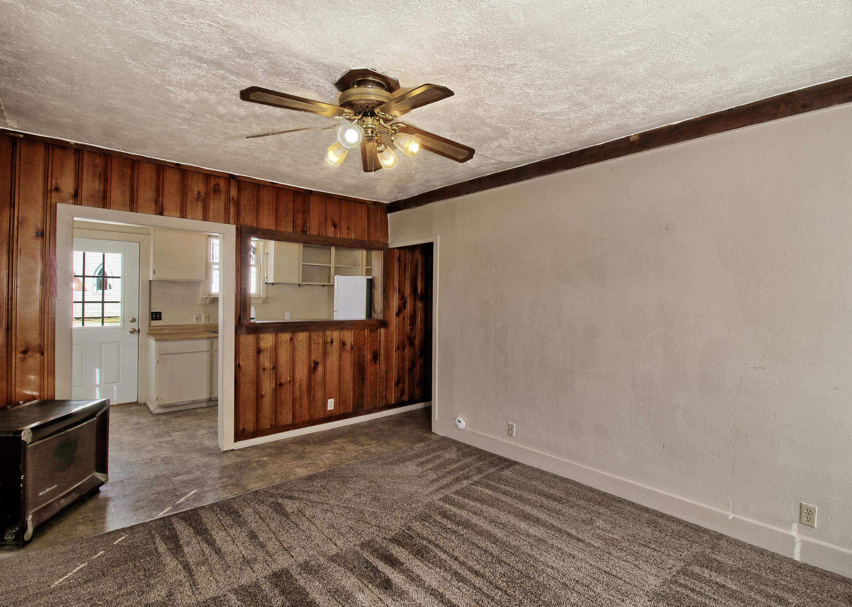 1002 Elm Avenue, Unit B Collbran, CO 81624 - Photo 10 of 17 a view of an empty room with a cabinet