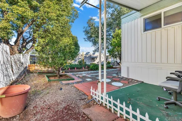 a garden view with a seating space