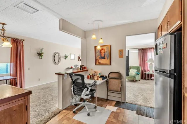 a bathroom with a sink a mirror and a shower