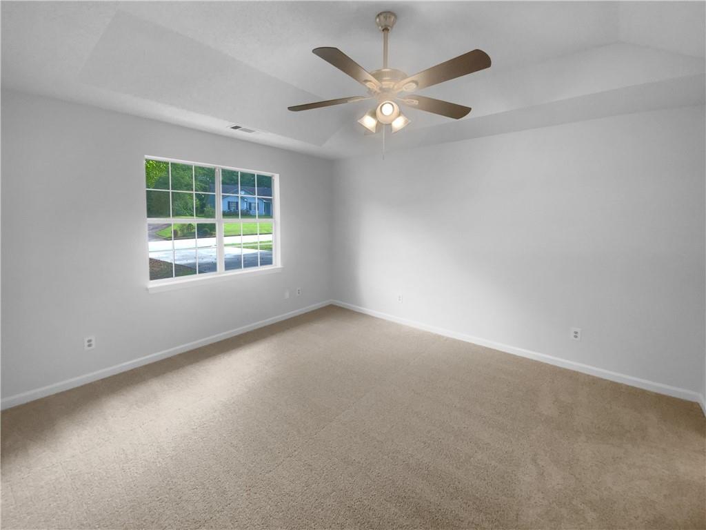 230 Myrtle Grove Lane Covington, GA 30014 - Photo 11 of 19 an empty room with a window