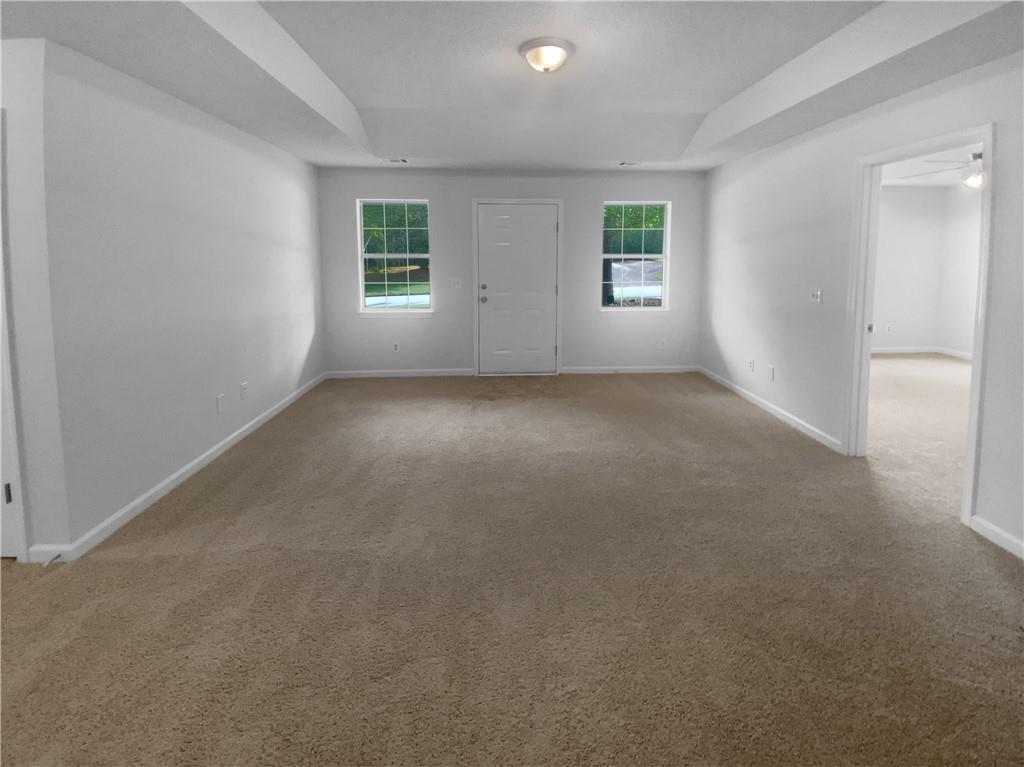 230 Myrtle Grove Lane Covington, GA 30014 - Photo 5 of 19 an empty room with windows