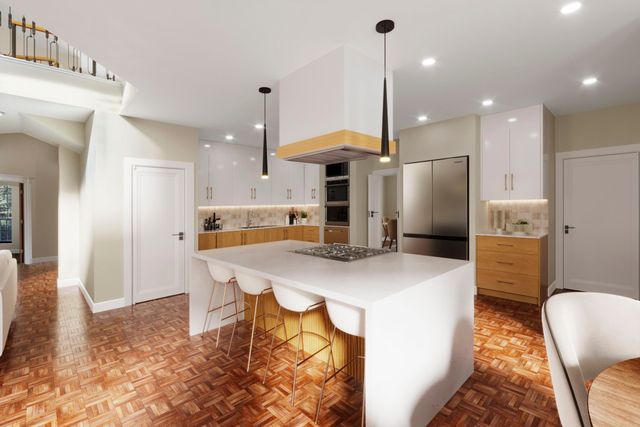 a kitchen with stainless steel appliances kitchen island granite countertop a refrigerator a stove a sink and a dining table with wooden floor