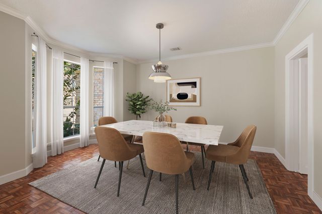 a living room with furniture and windows