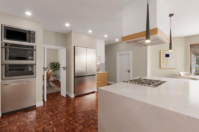 a spacious bathroom with a bathtub and shower