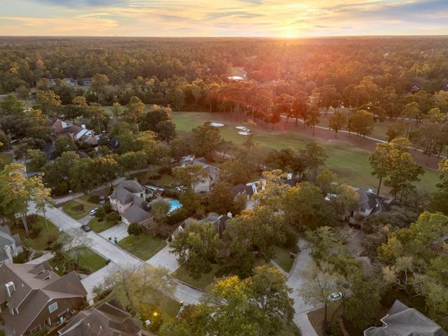 a kitchen with a stove sink and refrigerator
