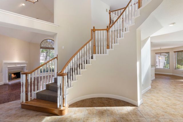 $975,900 | 49 Rolling Links Court, Spring, TX 77380