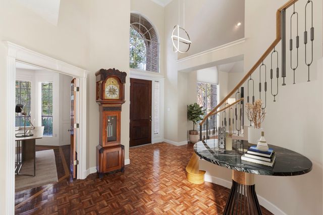 a view of entryway livingroom and hall