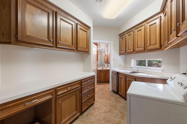 $975,900 | 49 Rolling Links Court, Spring, TX 77380