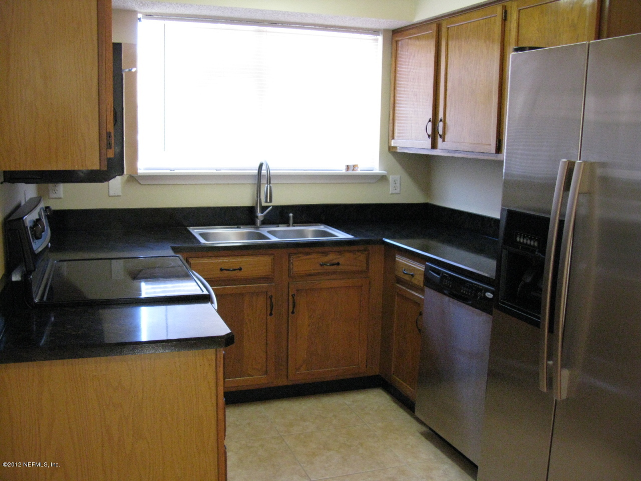 2449 Wattle Tree Road West Jacksonville, FL 32246 - Photo 14 of 16 Kitchen with Appliances View