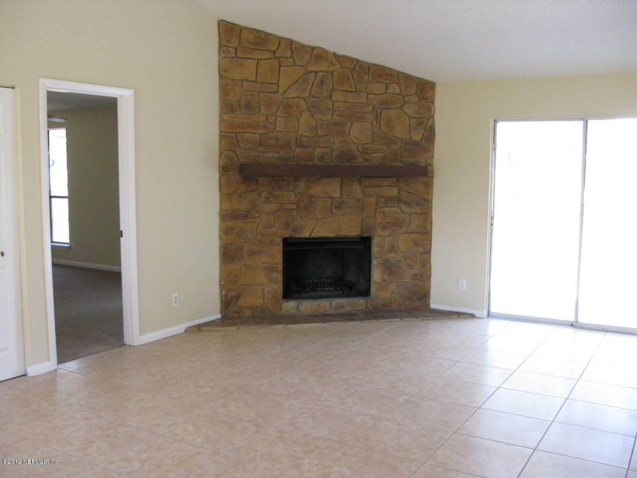 2449 Wattle Tree Road West Jacksonville, FL 32246 - Photo 7 of 16 Living Room with Fireplace