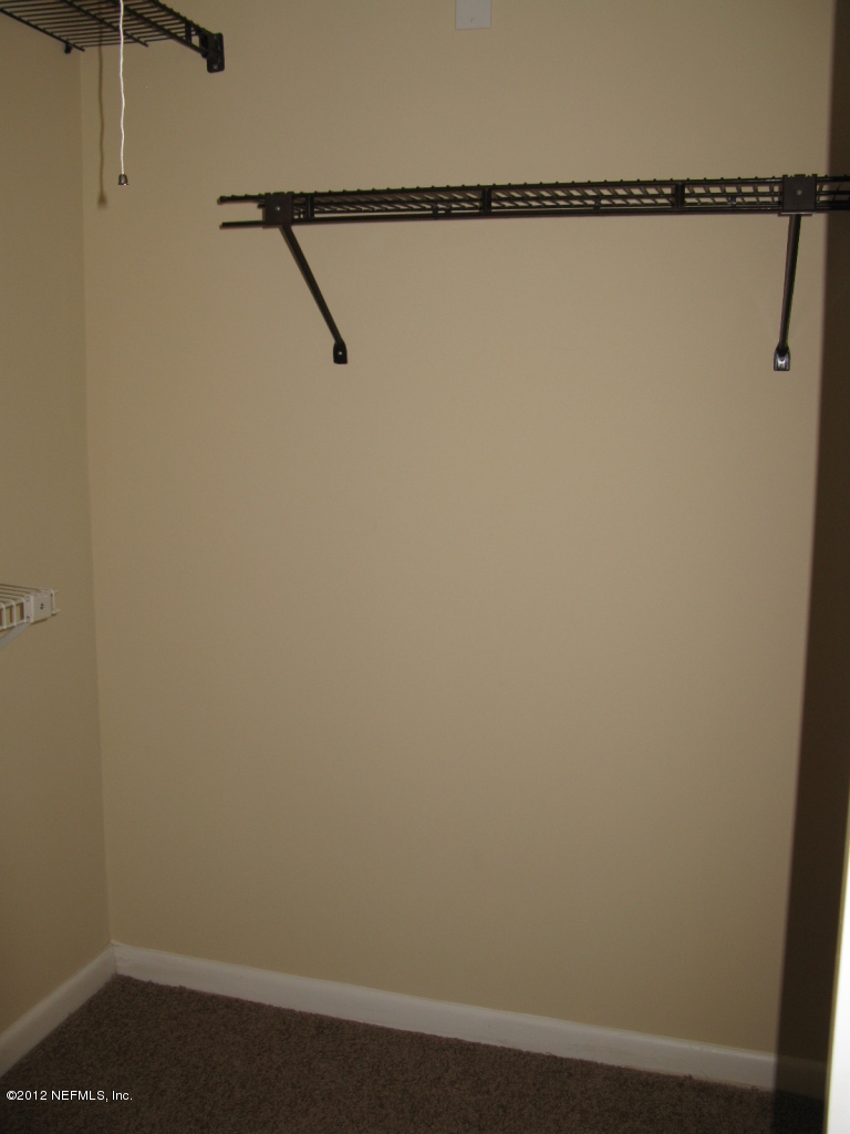 2449 Wattle Tree Road West Jacksonville, FL 32246 - Photo 10 of 16 Master Bedroom's Walk-In Closet