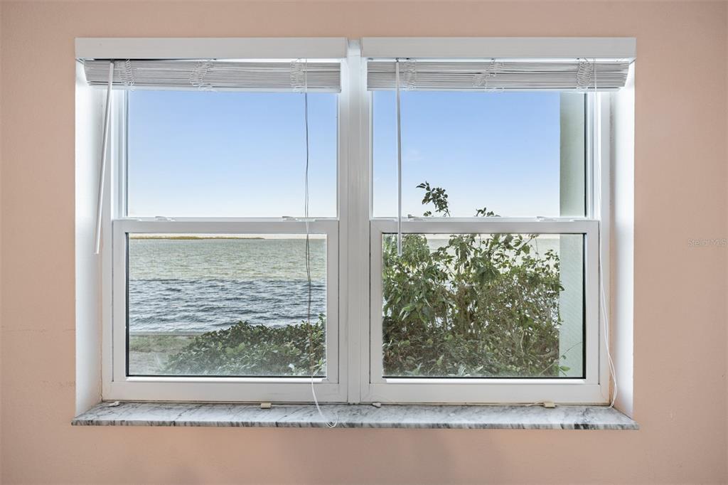 9 Haig Place, Unit 104 Dunedin, FL 34698 - Photo 11 of 59 a view of a wooden door