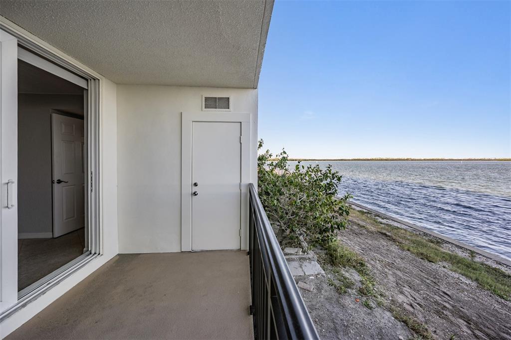 9 Haig Place, Unit 104 Dunedin, FL 34698 - Photo 19 of 59 a view of outdoor space and deck