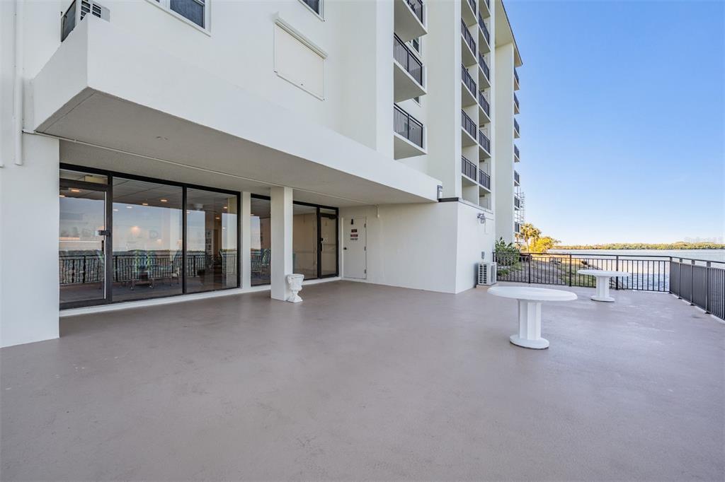 9 Haig Place, Unit 104 Dunedin, FL 34698 - Photo 29 of 59 a view of an empty room with a window