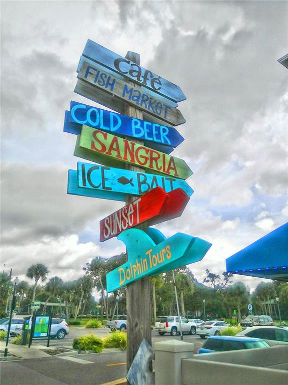 9 Haig Place, Unit 104 Dunedin, FL 34698 - Photo 58 of 59 a view of a street with sign board