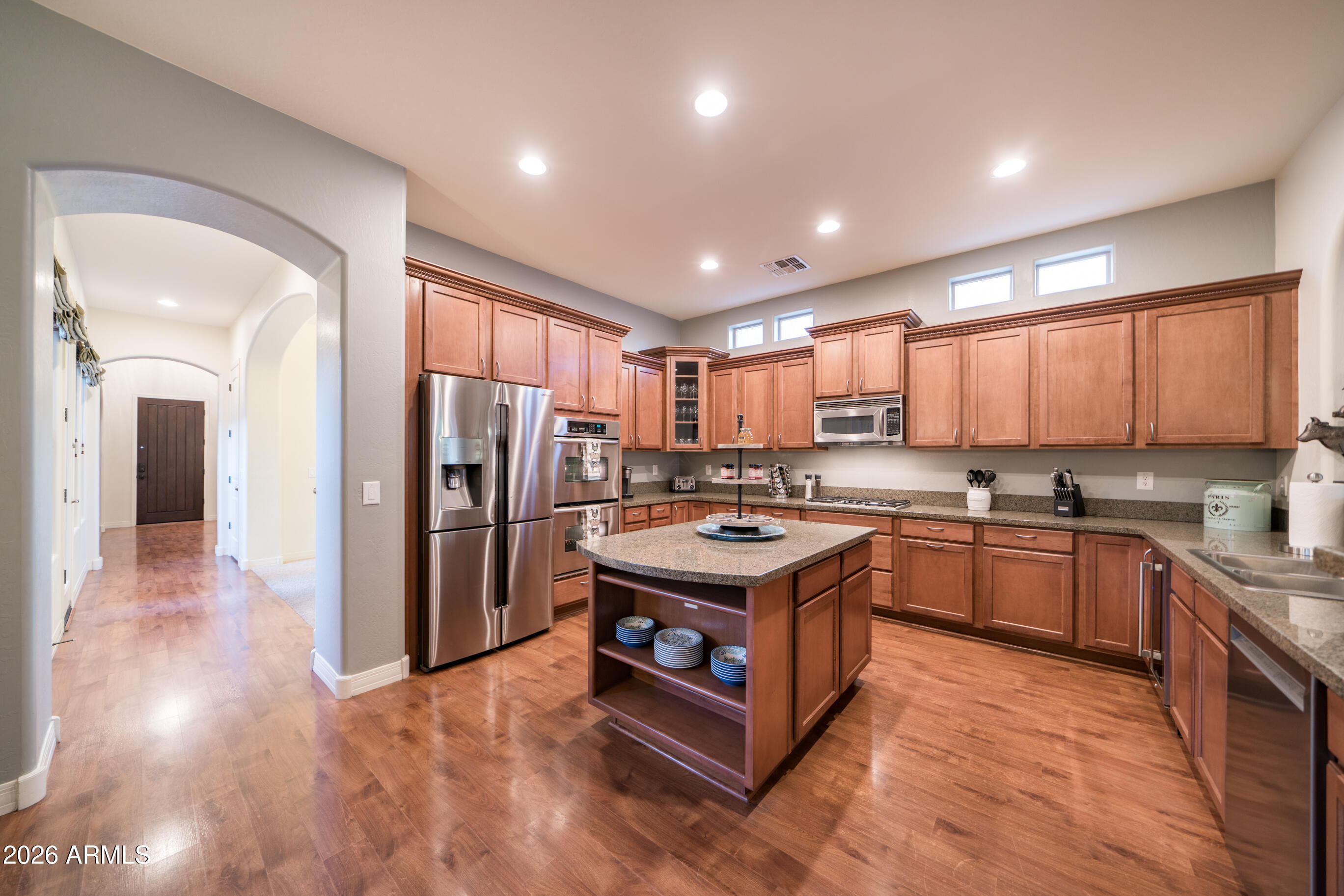 2681 East Hampton Lane Gilbert, AZ 85295 - Photo 13 of 88 a kitchen with stainless steel appliances granite countertop a stove a refrigerator a sink dishwasher and a oven