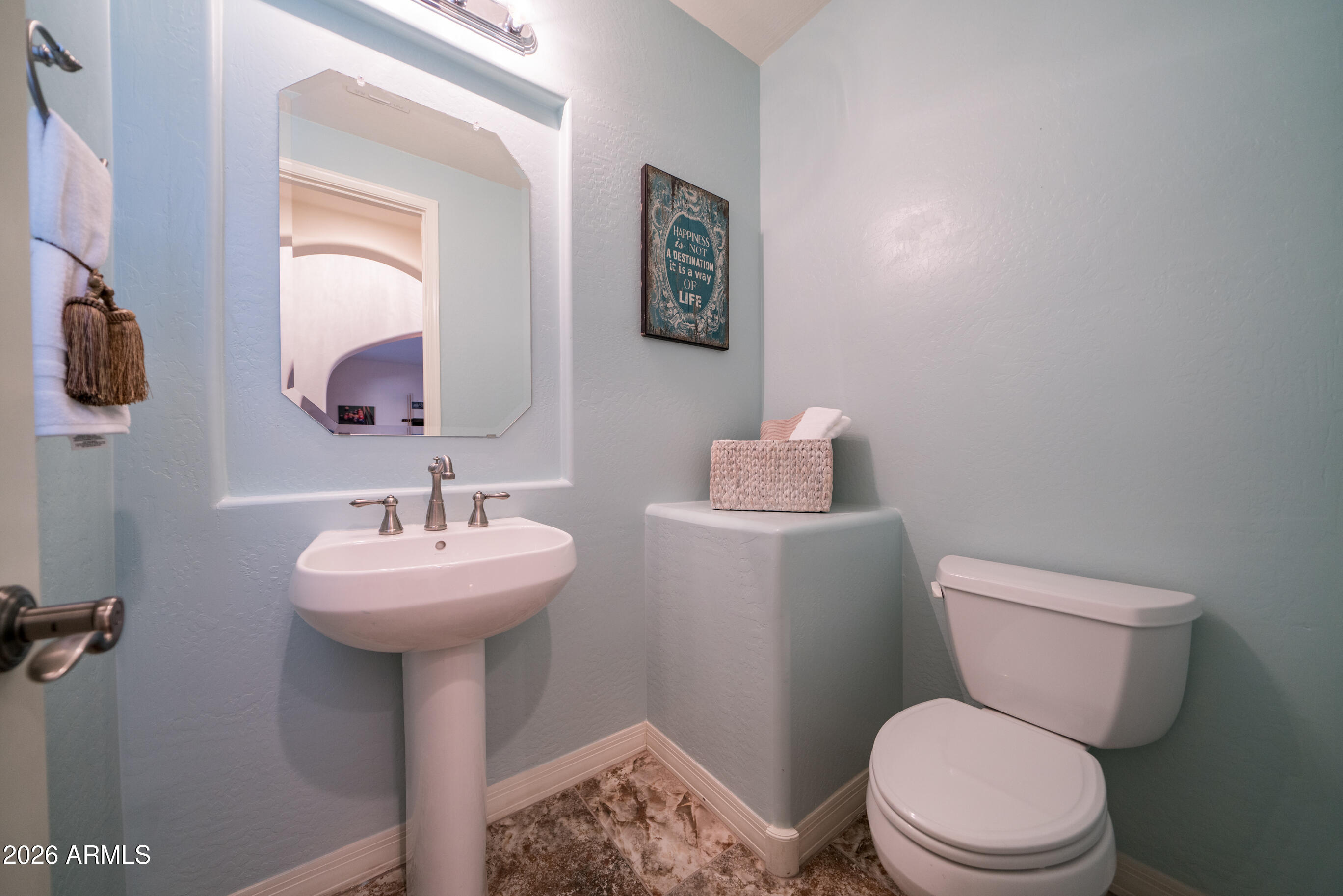 2681 East Hampton Lane Gilbert, AZ 85295 - Photo 24 of 88 a bathroom with a toilet sink and mirror
