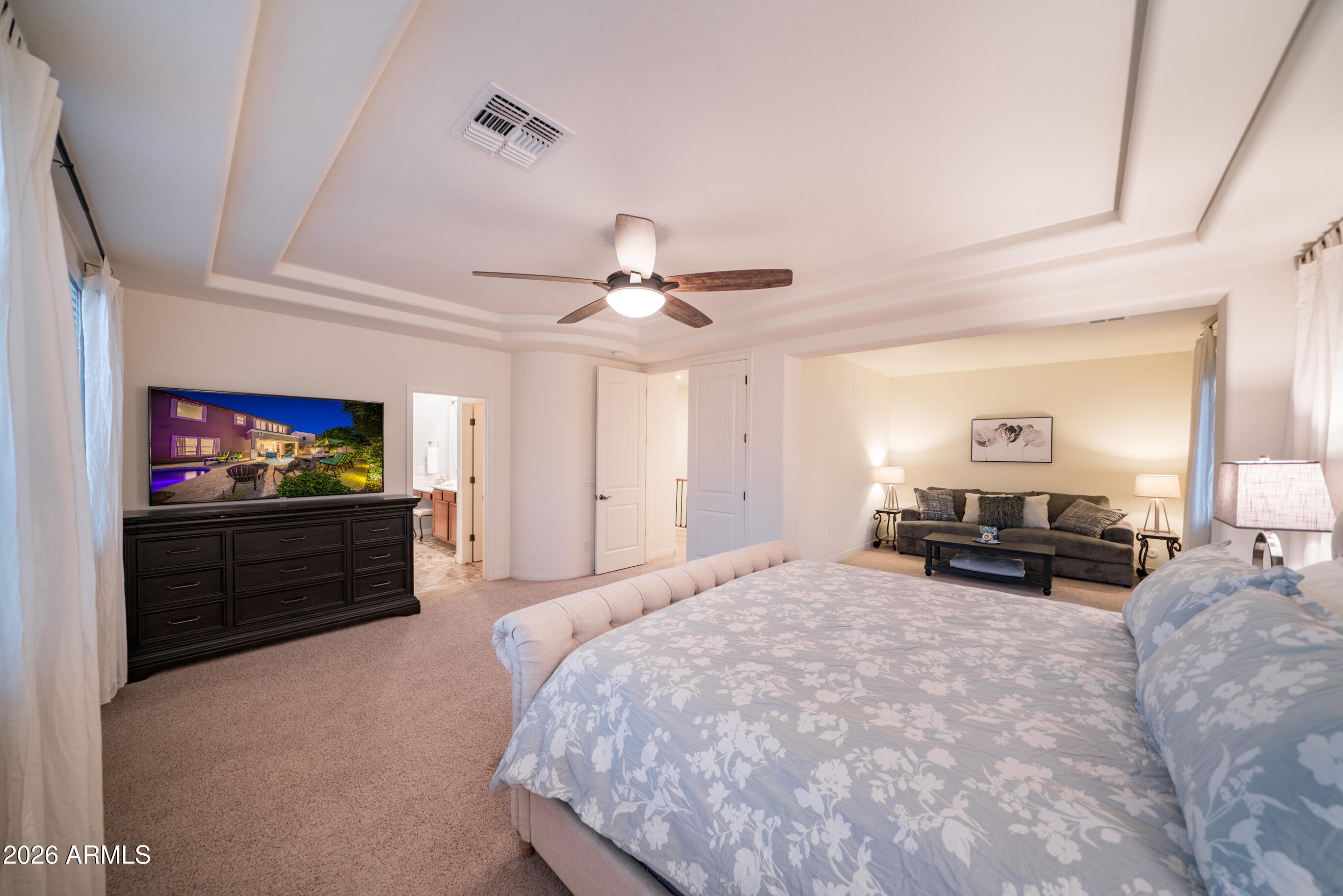 2681 East Hampton Lane Gilbert, AZ 85295 - Photo 32 of 88 a bed room with furniture and a flat screen tv