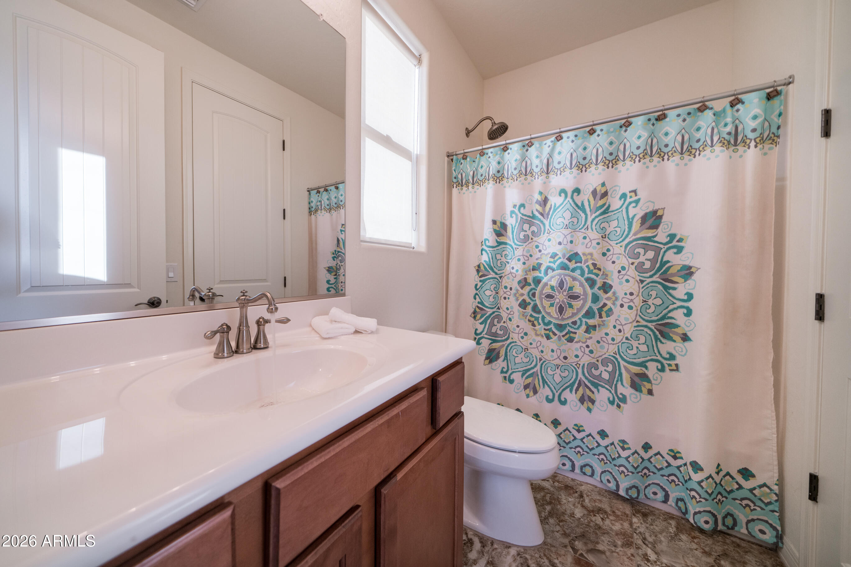 2681 East Hampton Lane Gilbert, AZ 85295 - Photo 45 of 88 a bathroom with a sink toilet and shower
