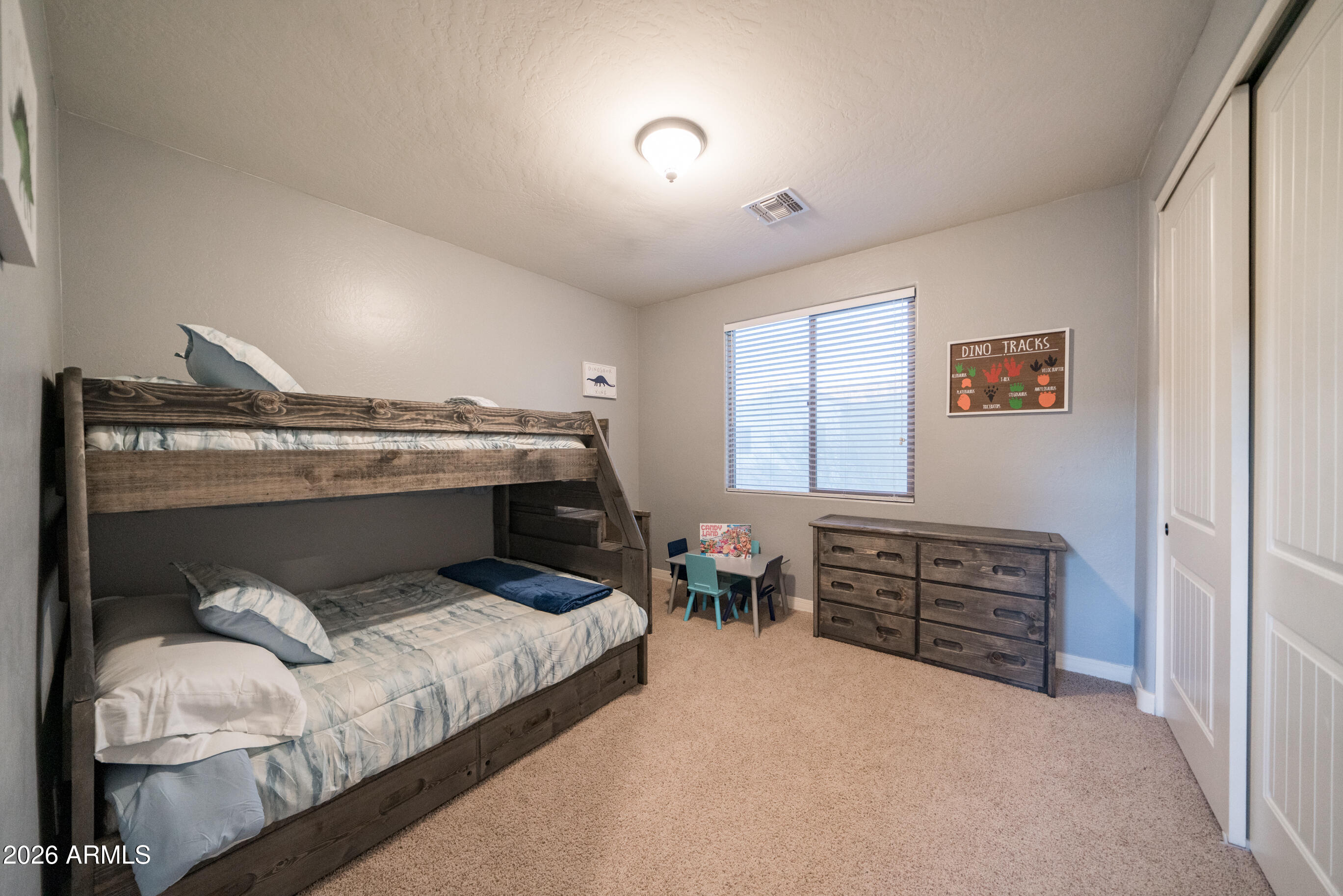 2681 East Hampton Lane Gilbert, AZ 85295 - Photo 47 of 88 a bedroom with a bed and furniture
