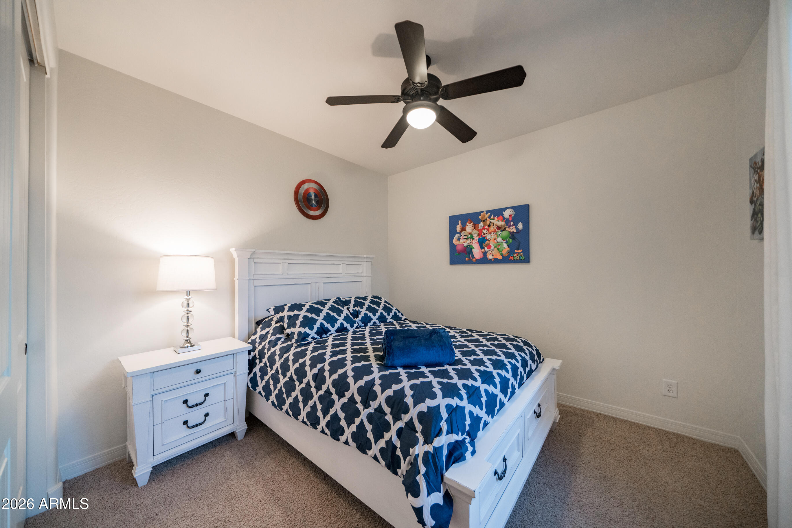 2681 East Hampton Lane Gilbert, AZ 85295 - Photo 50 of 88 a bedroom with a bed and a window