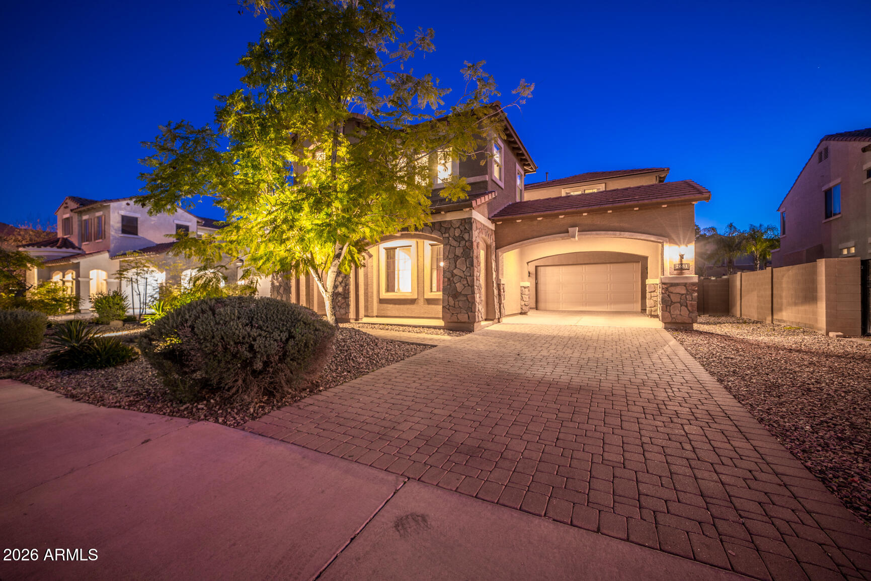 2681 East Hampton Lane Gilbert, AZ 85295 - Photo 61 of 88 a front view of a house with a yard