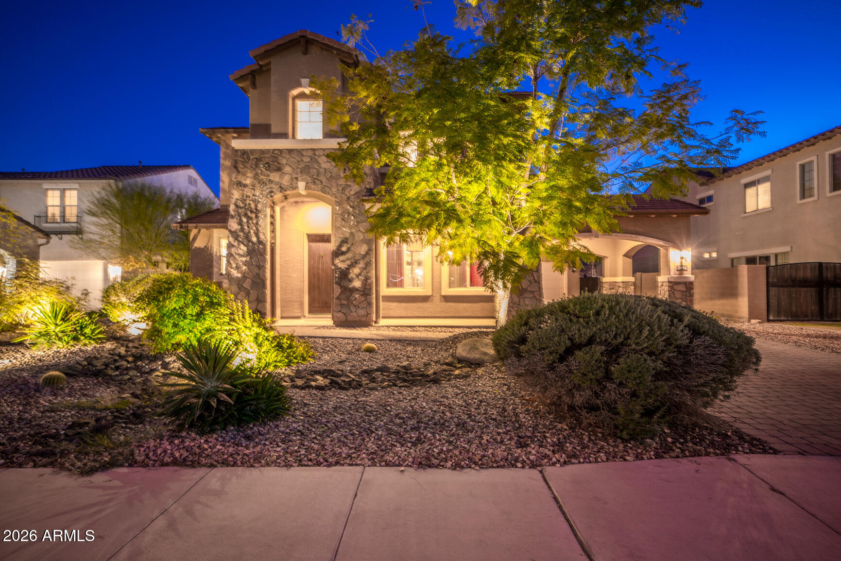 2681 East Hampton Lane Gilbert, AZ 85295 - Photo 62 of 88 a front view of a house with a yard