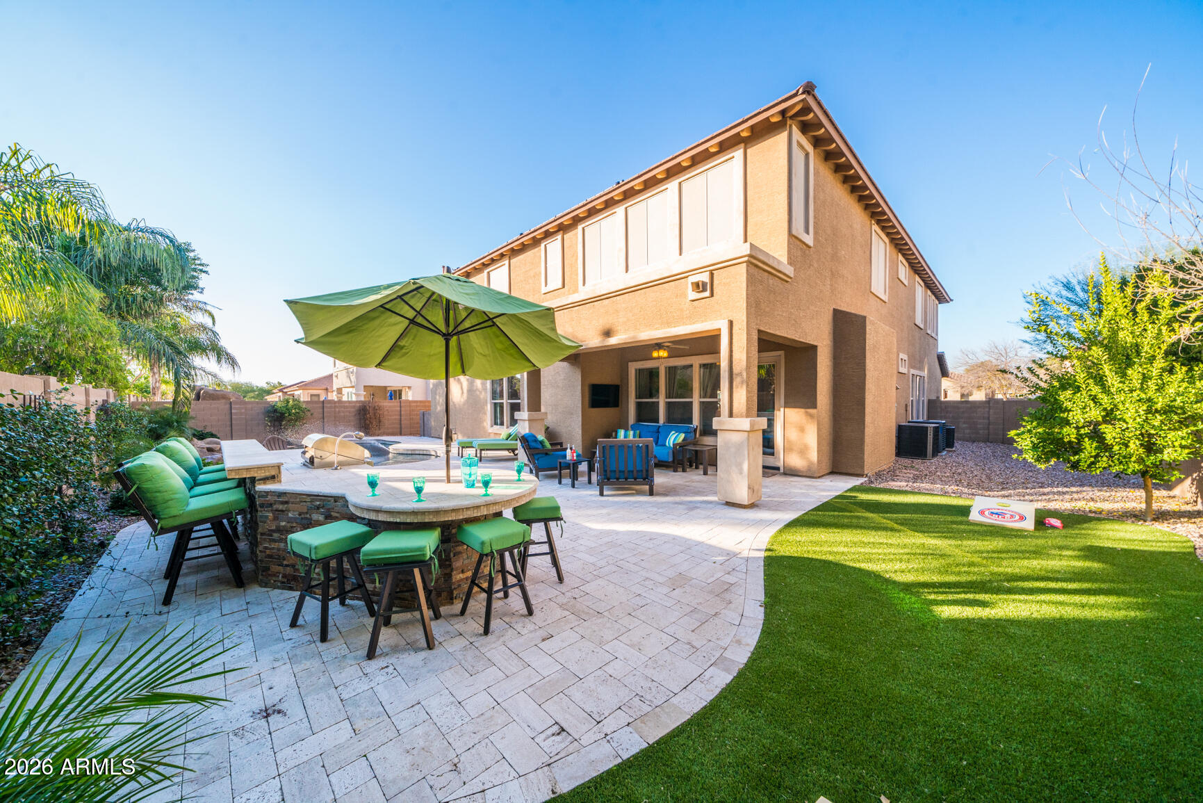 2681 East Hampton Lane Gilbert, AZ 85295 - Photo 65 of 88 a view of a house with backyard sitting area and garden