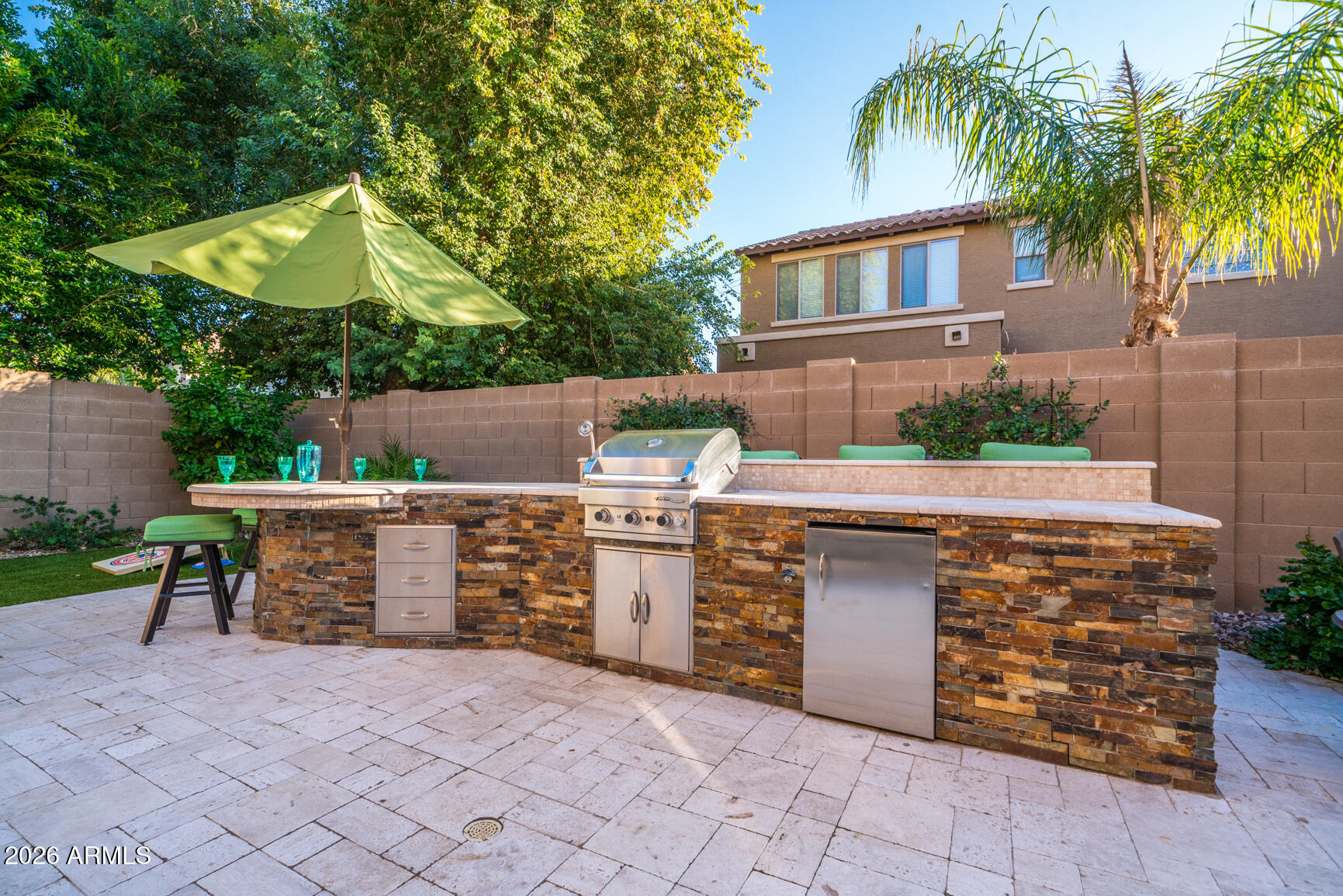 2681 East Hampton Lane Gilbert, AZ 85295 - Photo 68 of 88 front view of house with a yard and potted plants