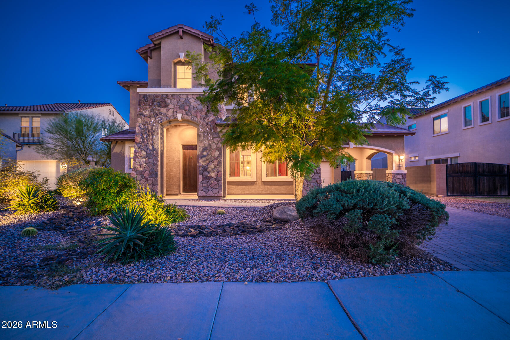 2681 East Hampton Lane Gilbert, AZ 85295 - Photo 81 of 88 a front view of a house with a yard