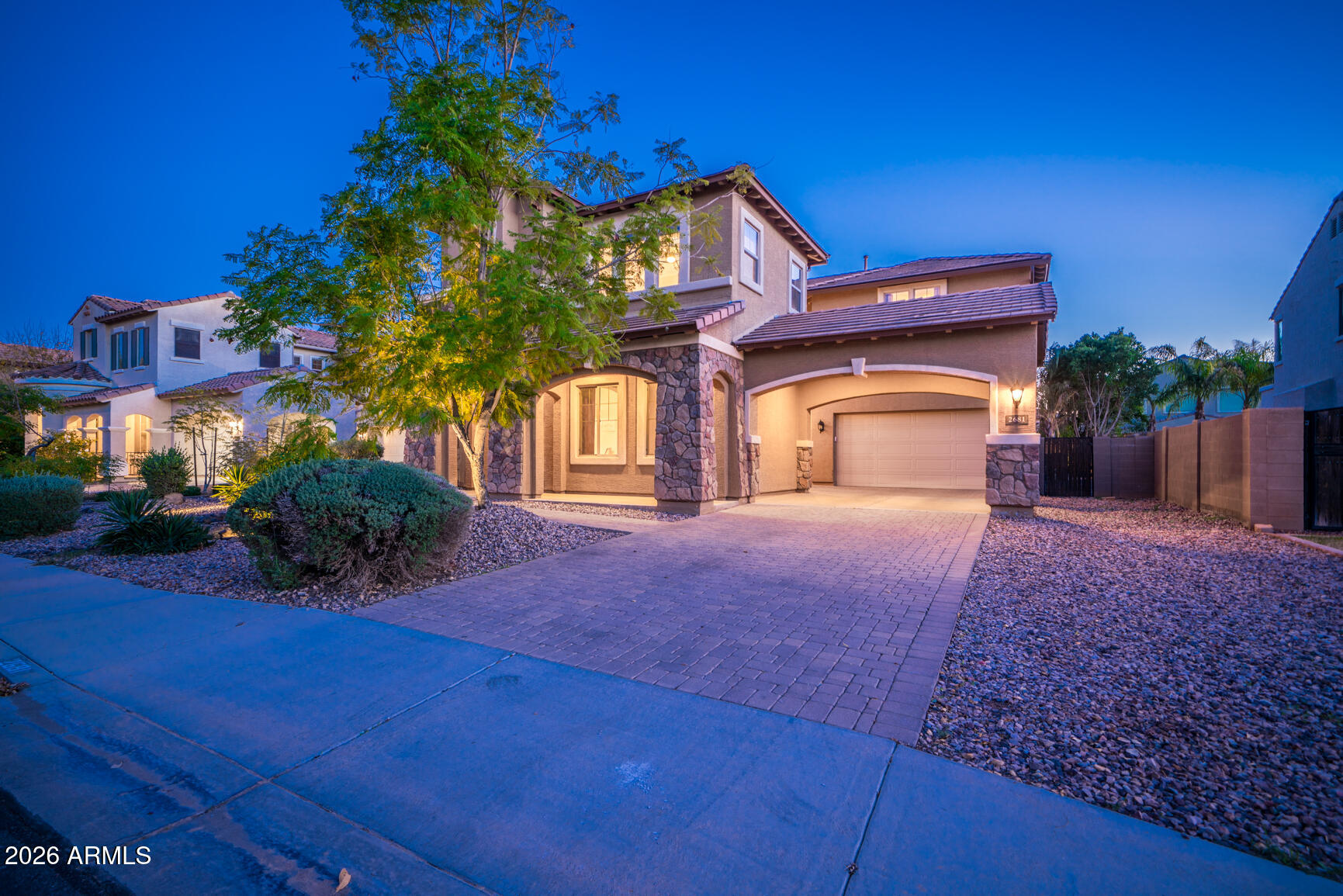 2681 East Hampton Lane Gilbert, AZ 85295 - Photo 82 of 88 a front view of a house with a yard