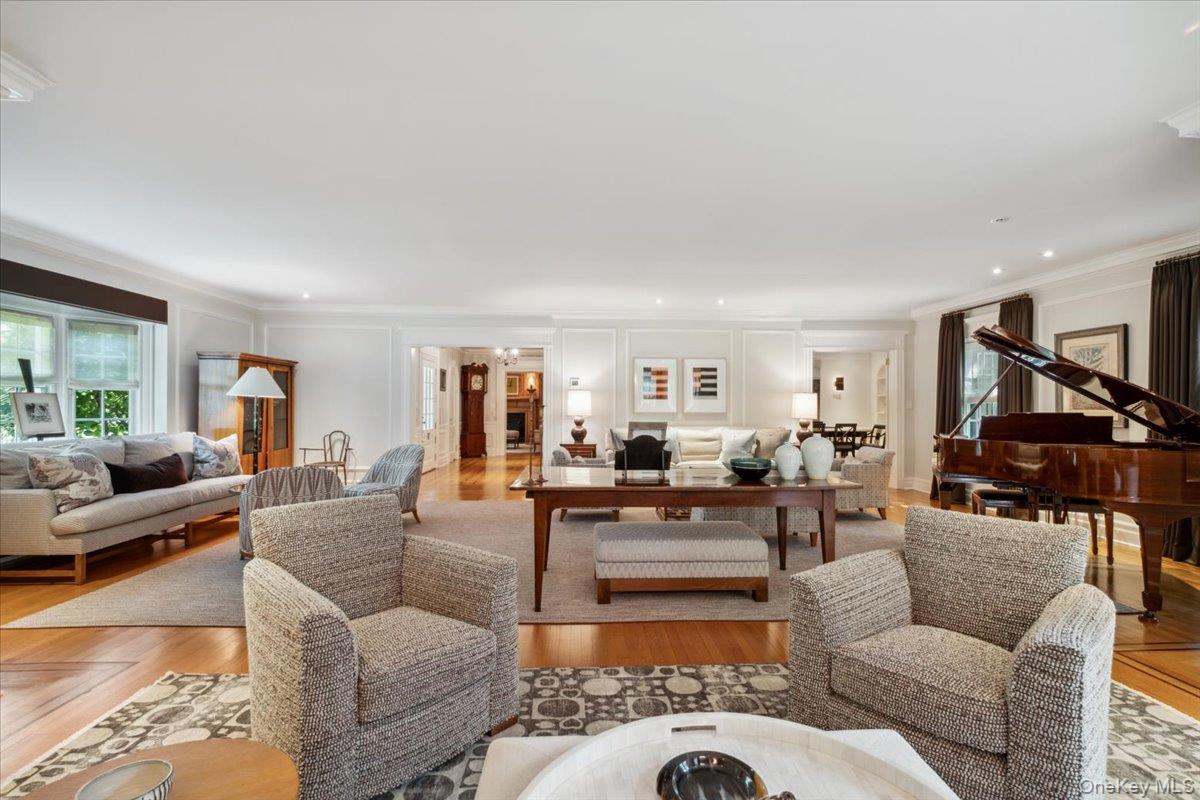 18 Richbell Road Scarsdale, NY 10583 - Photo 12 of 40 Another view of the living room/great room looking into the entry way and formal dining room