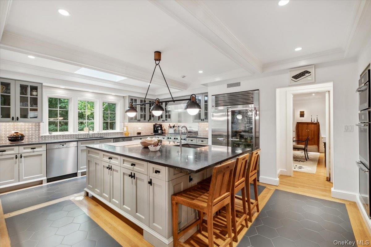 18 Richbell Road Scarsdale, NY 10583 - Photo 16 of 40 Expansive center island for casual dining and effortless preparing and entertaining