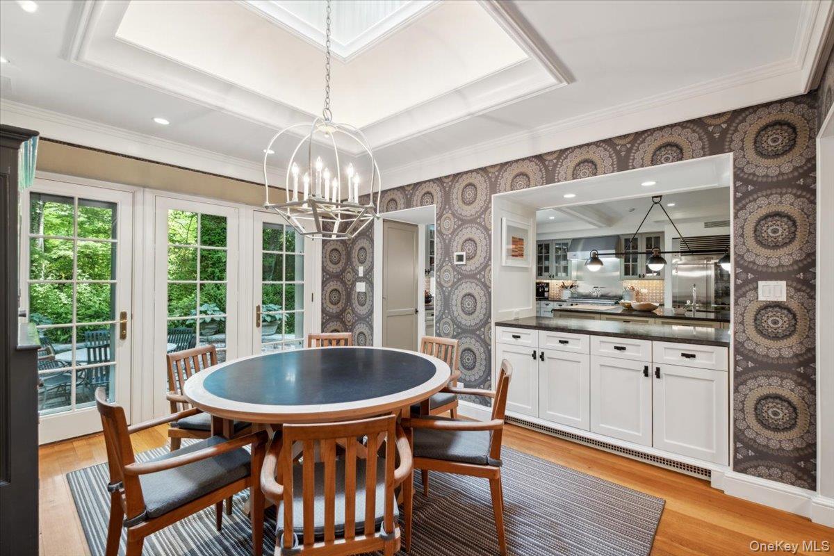 18 Richbell Road Scarsdale, NY 10583 - Photo 18 of 40 Sun filled breakfast room with generous counter space for serving. French doors to side patio Skylight