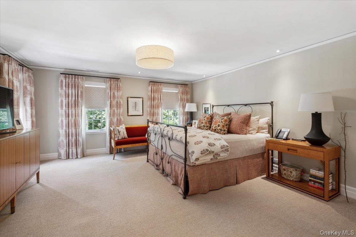 18 Richbell Road Scarsdale, NY 10583 - Photo 21 of 40 Tranquil primary bedroom with French doors into a sitting room