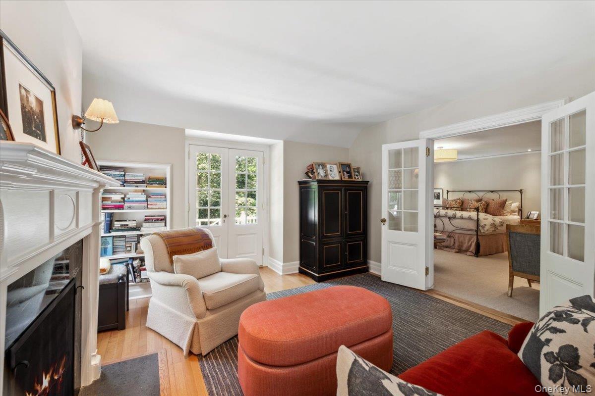 18 Richbell Road Scarsdale, NY 10583 - Photo 23 of 40 Sitting room with French doors off of the Primary bedroom and French doors to useable balcony overlooking the sweeping grounds