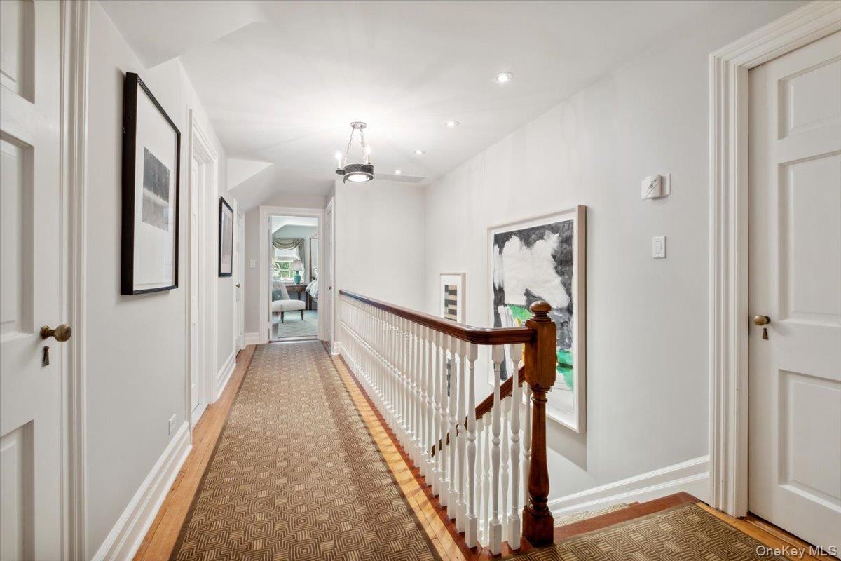 18 Richbell Road Scarsdale, NY 10583 - Photo 32 of 40 Thrid floor landing, 2 bedrooms, hall bath, cedar closet, walk in attic storage space