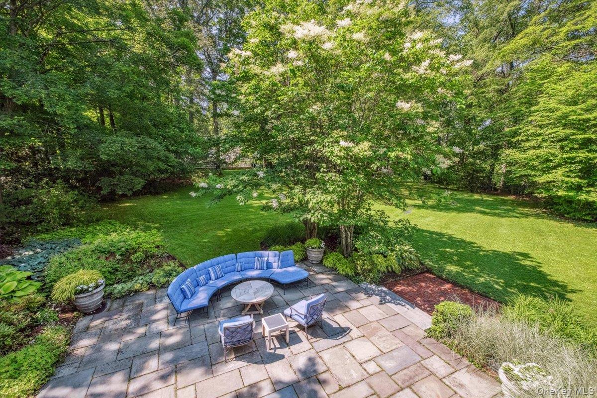 18 Richbell Road Scarsdale, NY 10583 - Photo 4 of 40 Bluestone patio off of screened in porch