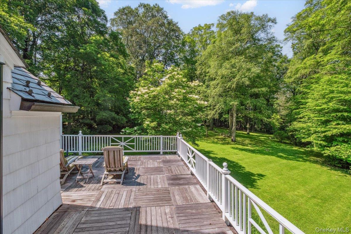 18 Richbell Road Scarsdale, NY 10583 - Photo 5 of 40 Balcony from the primary bedroom overlooking the grounds