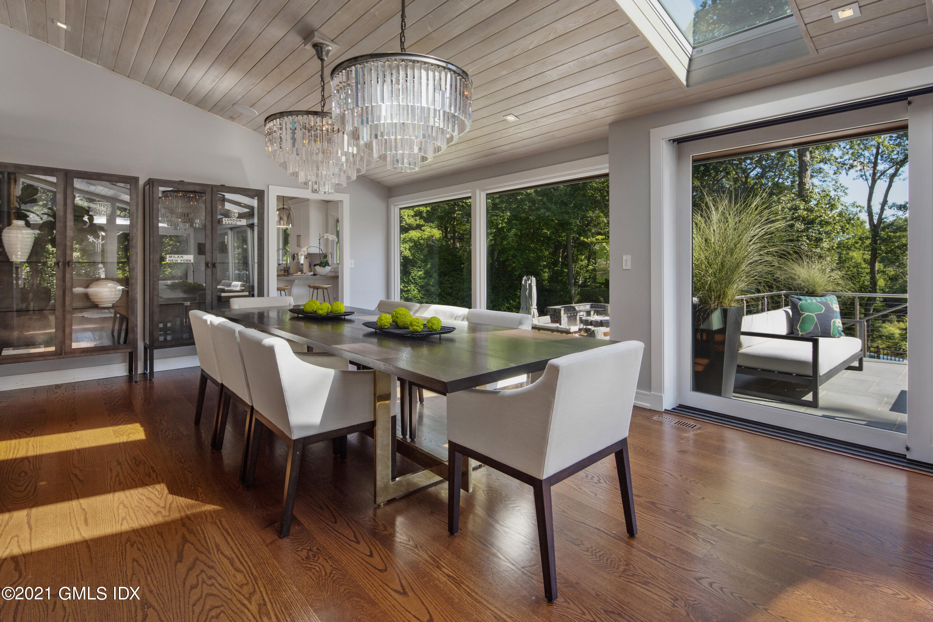 11 Old Forge Road Greenwich, CT 06830 - Photo 14 of 34 a view of a dining room with furniture wooden floor and chandelier