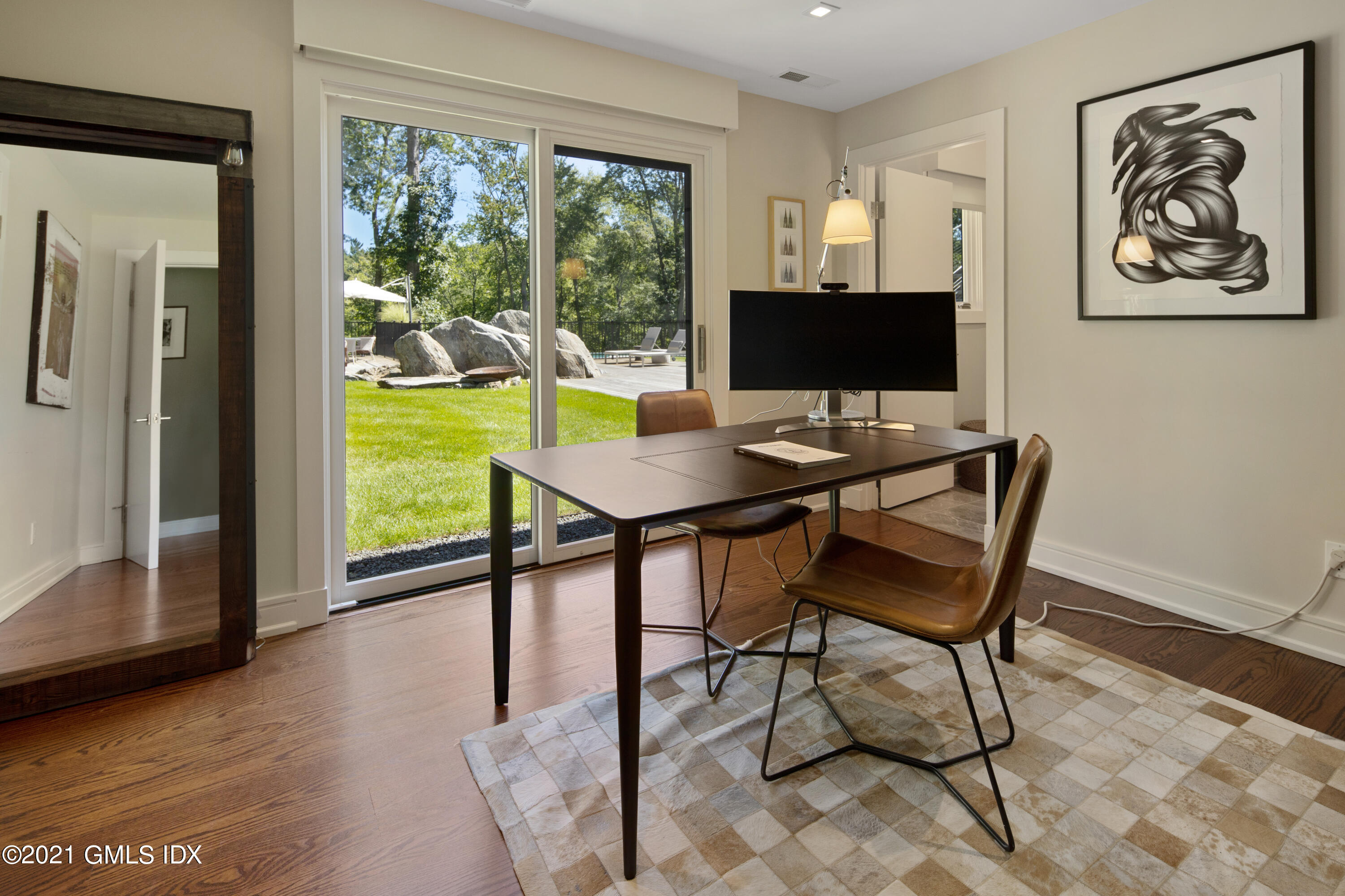 11 Old Forge Road Greenwich, CT 06830 - Photo 24 of 34 a view of a workspace with furniture and a window