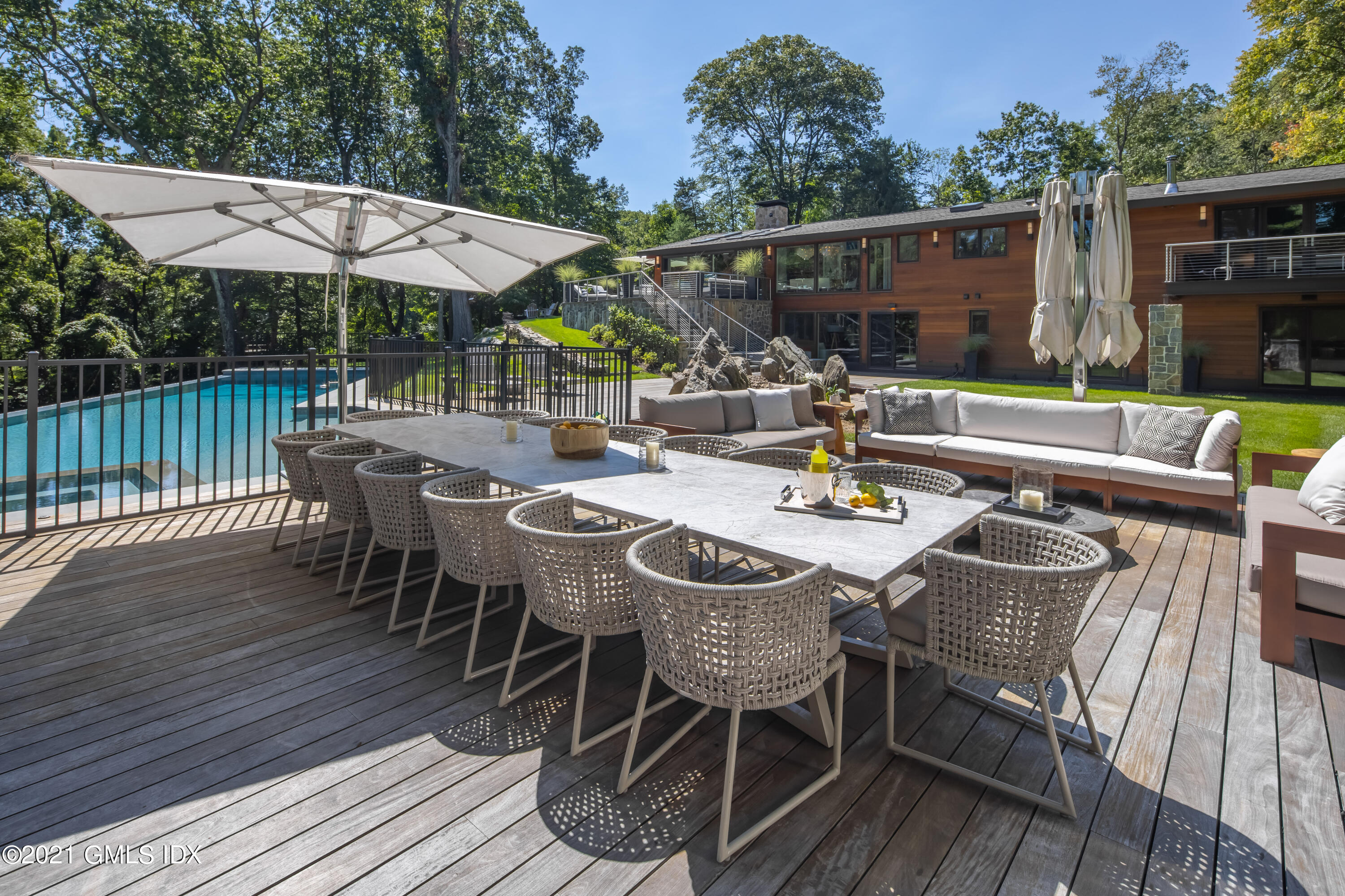 11 Old Forge Road Greenwich, CT 06830 - Photo 28 of 34 a view of a table and chairs in the patio