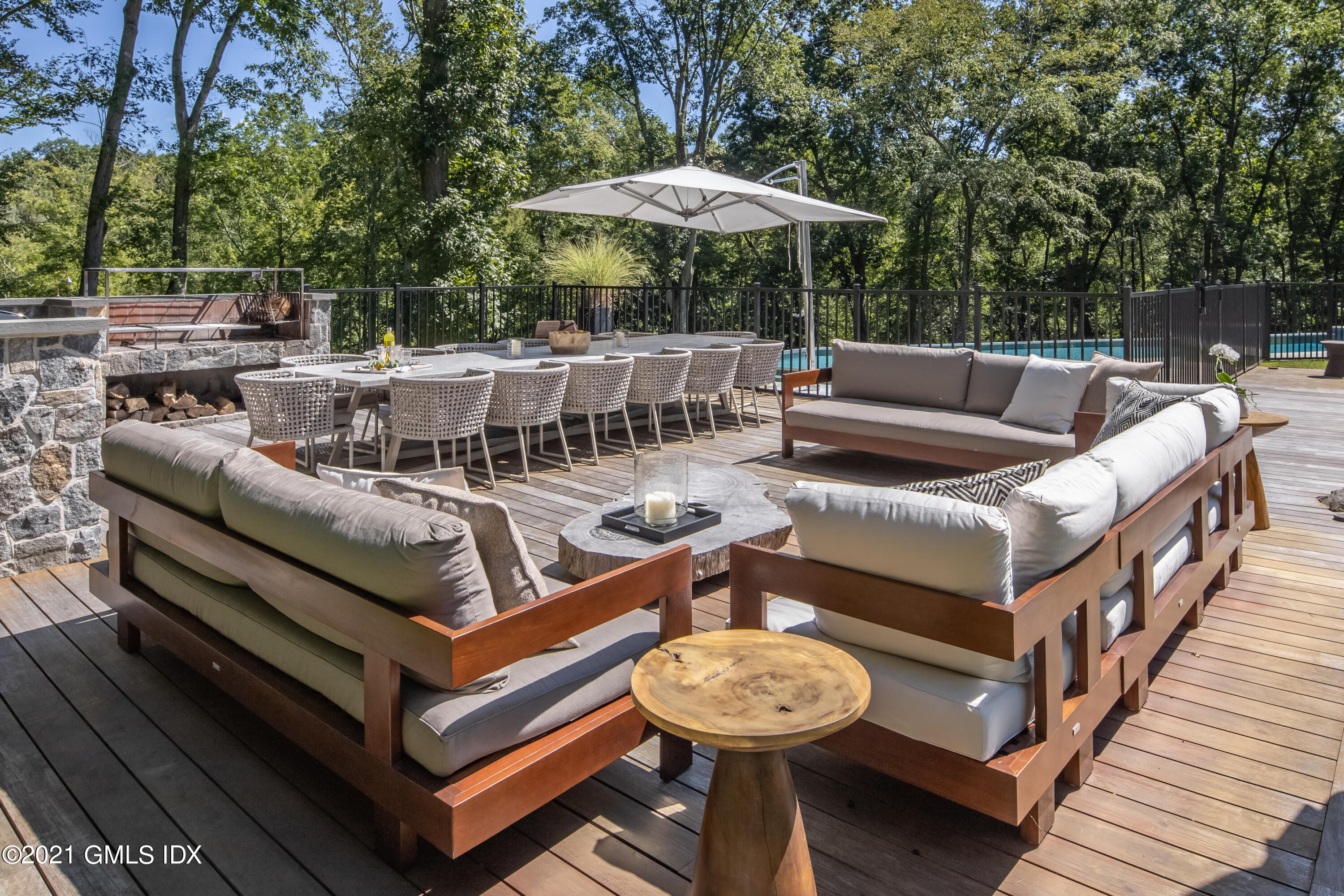11 Old Forge Road Greenwich, CT 06830 - Photo 29 of 34 a view of a patio with a table and chairs